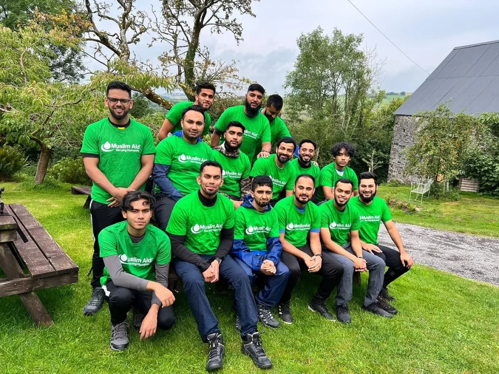 Roots Foundation Trust charity trek team in green t-shirts, 2022